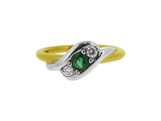 emerald and diamond crossover ring