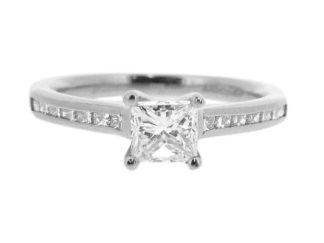 Princess cut solitaire with shoulder diamonds